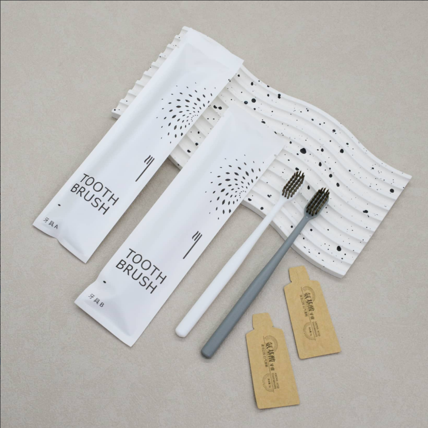 通货-灰白大头圆柱石头纸（送纸袋牙膏）牙刷克重：全新料8克pp聚丙烯 刷毛：0.15mm咖棕火焰毛 牙膏：3g氨基酸牙膏 包装：三边封石头纸 孔数：31孔（1000/箱）整箱发货