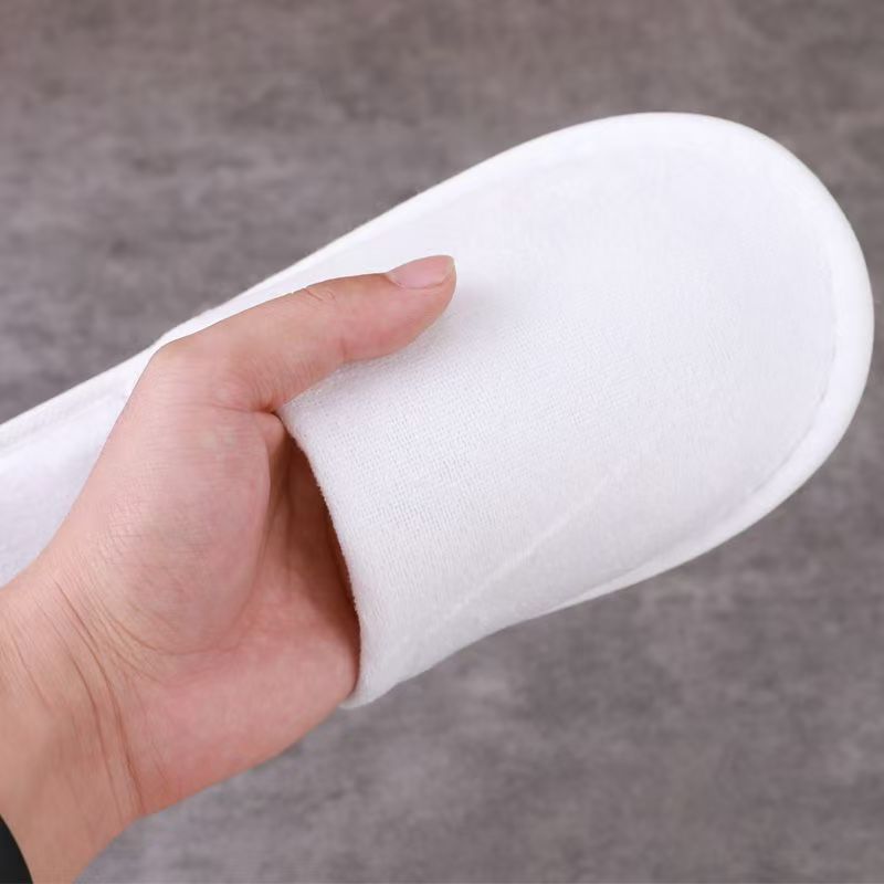 拉毛拖鞋鞋底：5mm 骨头纹 帮面：拉毛复合2mm海绵  盖面：拉毛布复合2mm海绵  包边条：灰色无纺布包边  内衬：无纺布