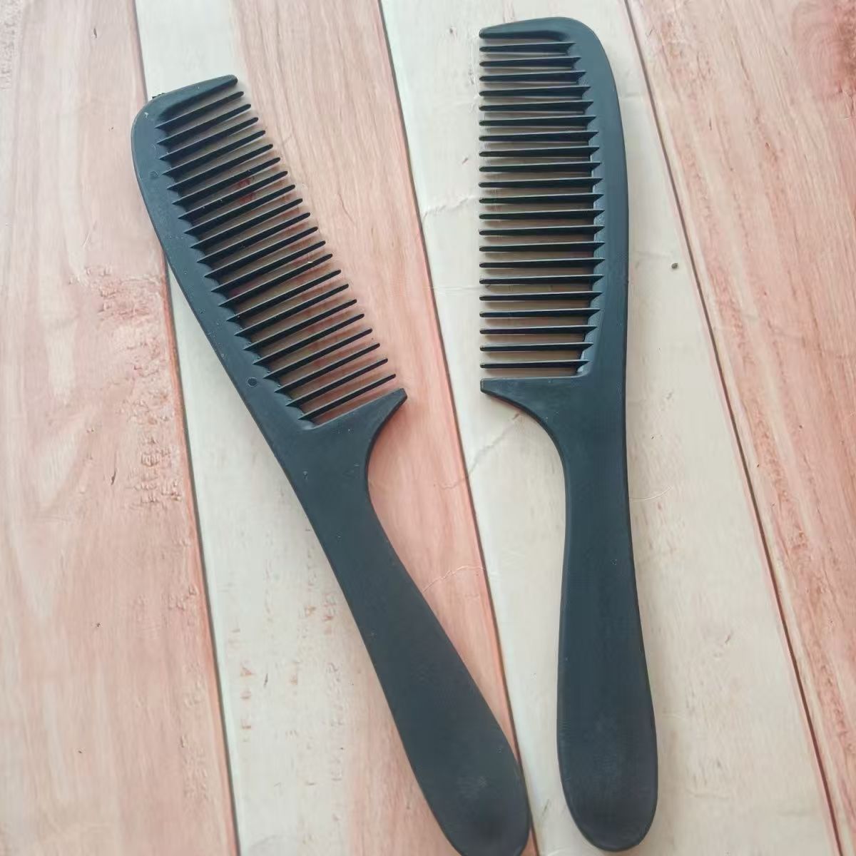 星光膜 黑大丽枫梳梳子克重：14克 材质：PP 包装：12丝星光膜5*22cm